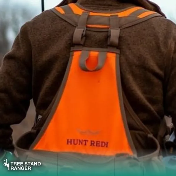 orange vest for hunters using climbing stand